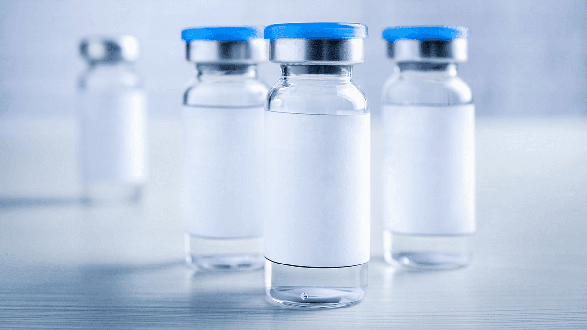 Pharmaceutical-grade peptide vials prepared in a controlled laboratory setting, representing batch production of sterile peptide therapies manufactured under quality standards for clinical use and safety.